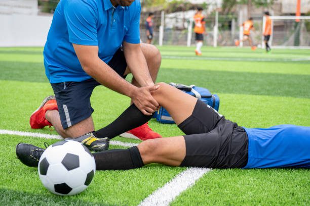 Footballer wearing Sports and pain images